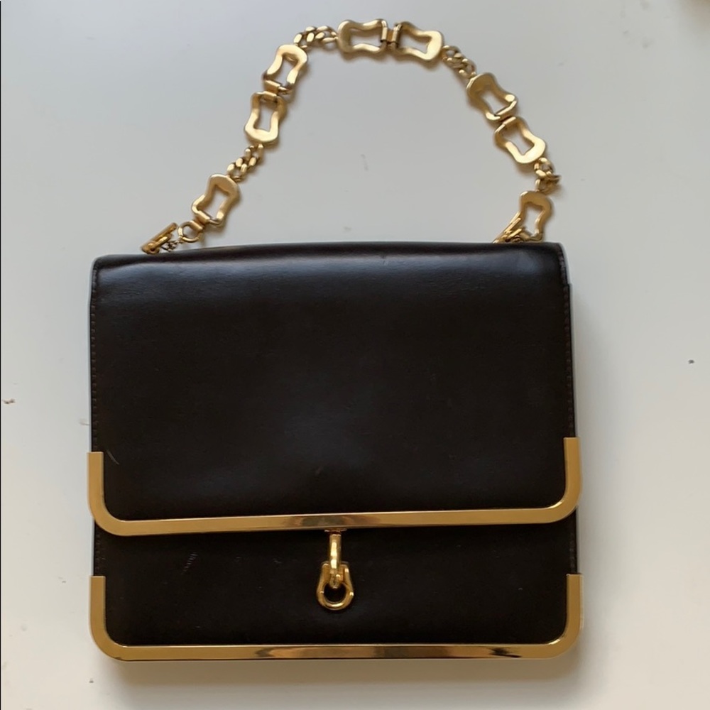 Vintage clutch with golden lining and handle